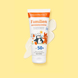 PAEDIPROTECT Familiensonnencreme LSF 50+ in der Tube, daneben ein Klecks Creme.