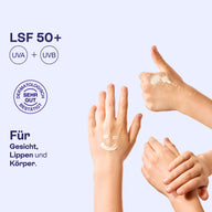 Hände mit Sonnencreme, LSF 50+, Schutz vor UVA und UVB.