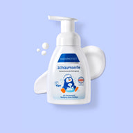 PAEDIPROTECT Schaumseife in der Pumpflasche, daneben Schaum.