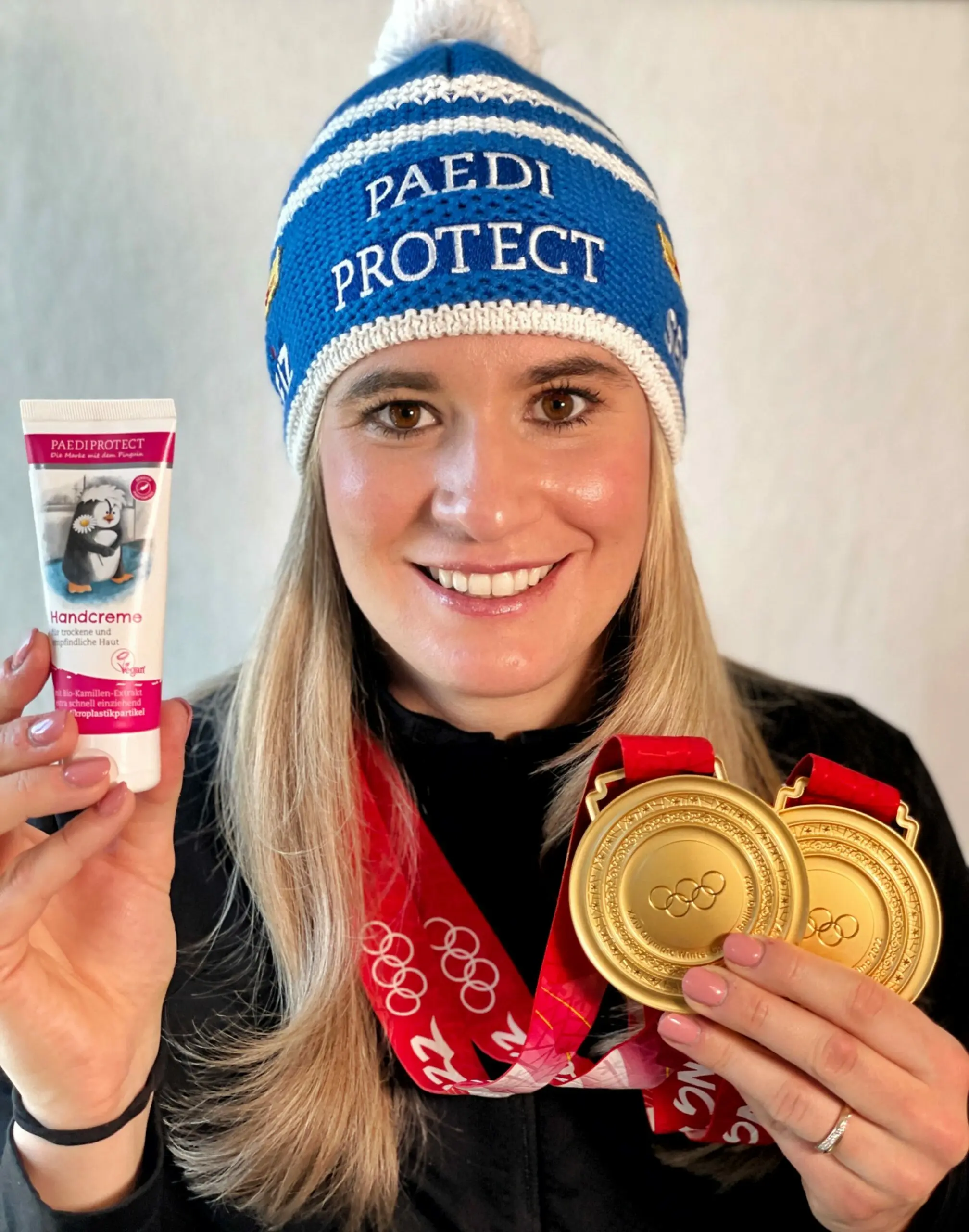 Bild Natalie Geisenberger Goldmedaille Bild Natalie Geisenberger Goldmedaille scaled
