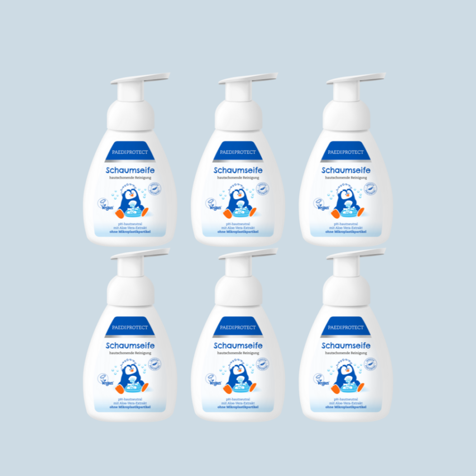 a group of plastic bottles with a blue and white label
