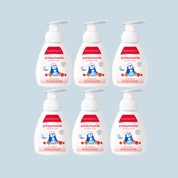 a group of plastic bottles with a red and white label