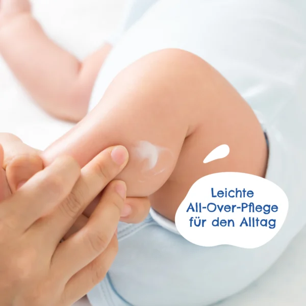 a baby's leg with cream on it