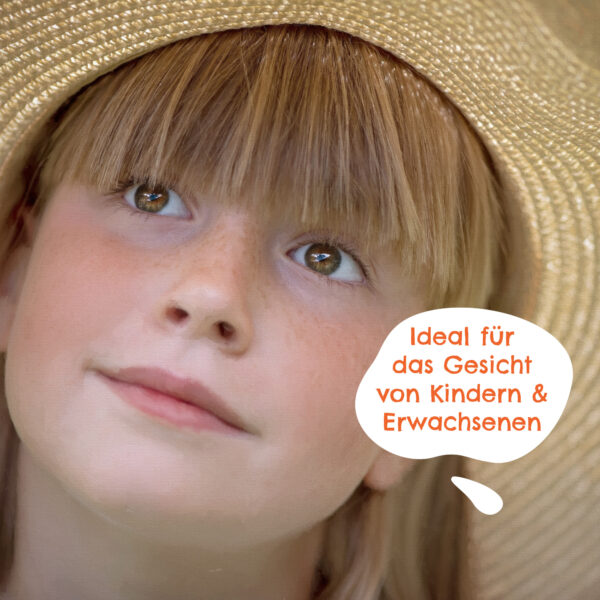 Startseite 23 a girl wearing a straw hat