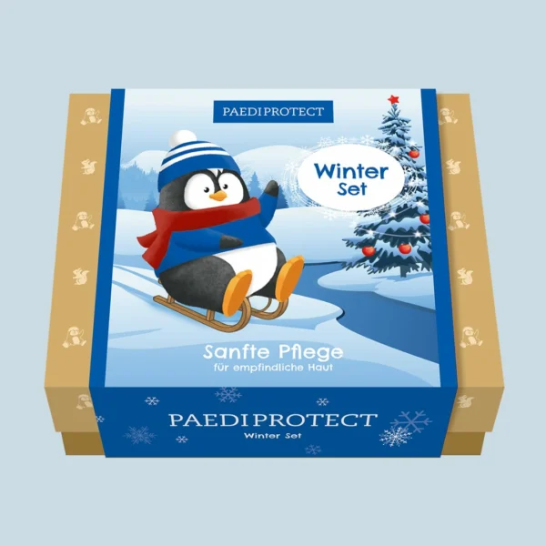 a box with a penguin on a sled